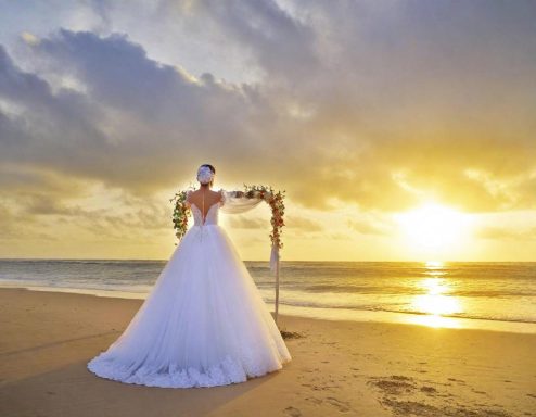 Bride at a Caribbean beach destination wedding and honeymoon at an all-inclusive resort